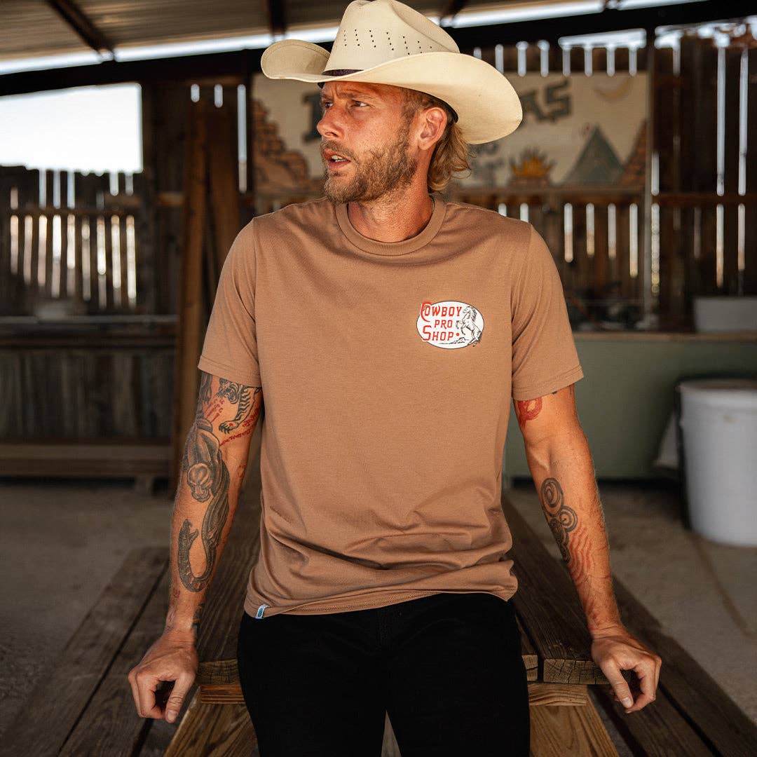 Cowboy Pro Shop T-Shirt: Light Brown / Medium