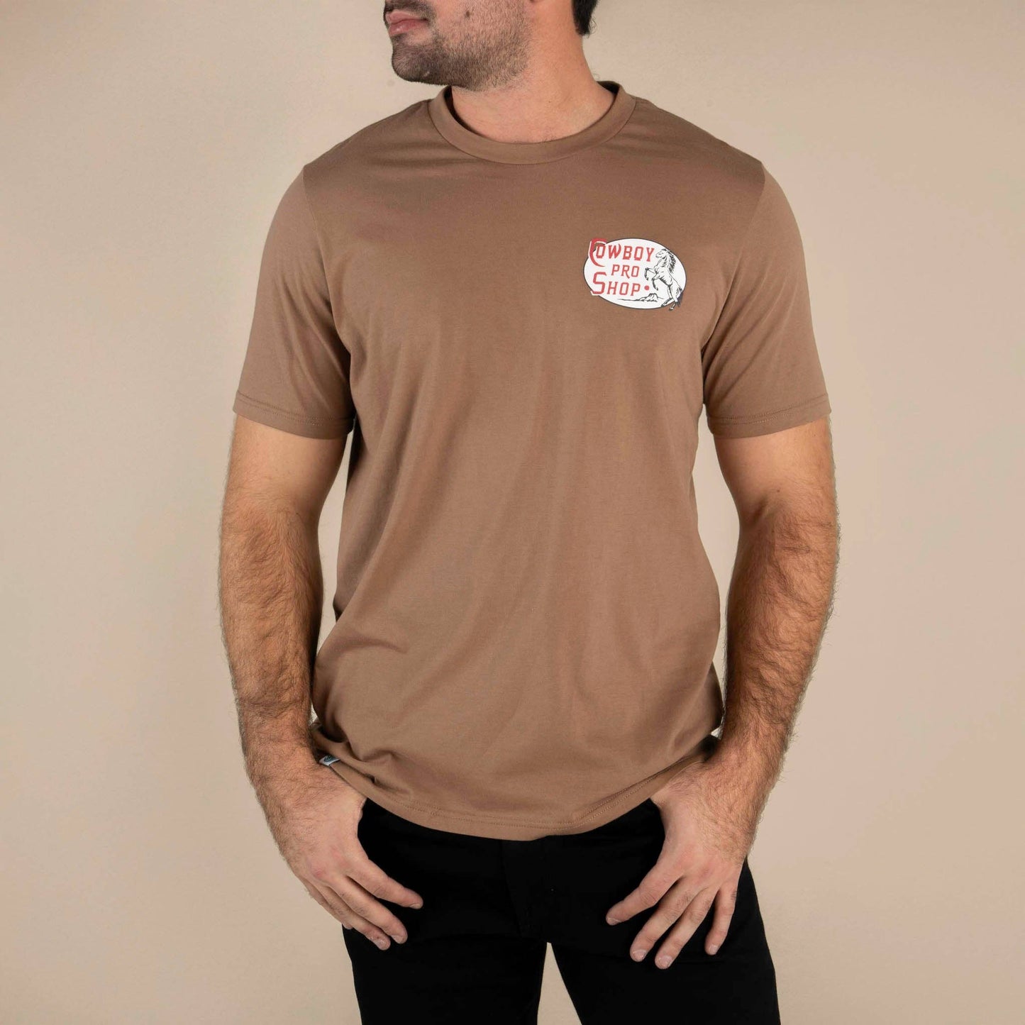 Cowboy Pro Shop T-Shirt: Light Brown / Medium