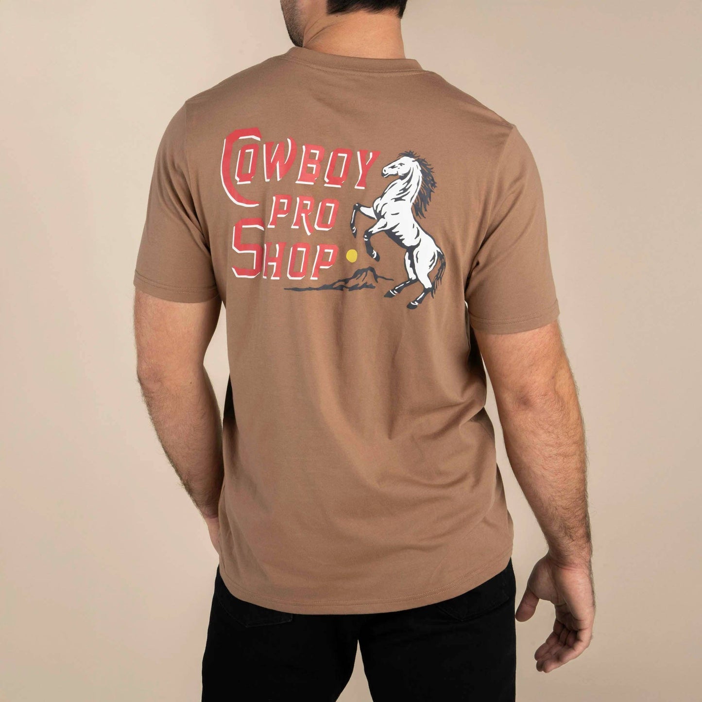 Cowboy Pro Shop T-Shirt: Light Brown / Medium