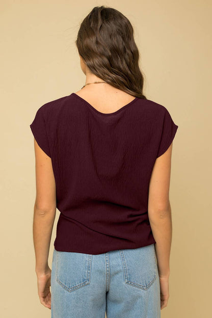 SOLID WOVEN TEE WITH FRONT KNOT DETAIL: RAISIN