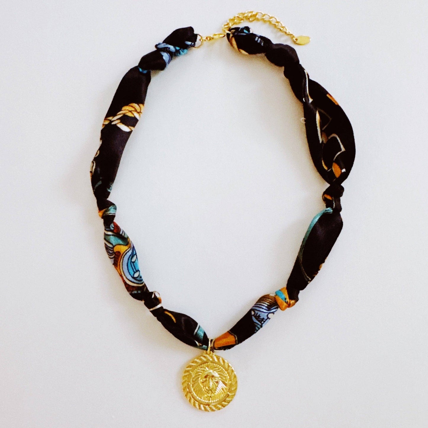 Luxe Print Lion Medallion Pendant Scarf Necklace: Black