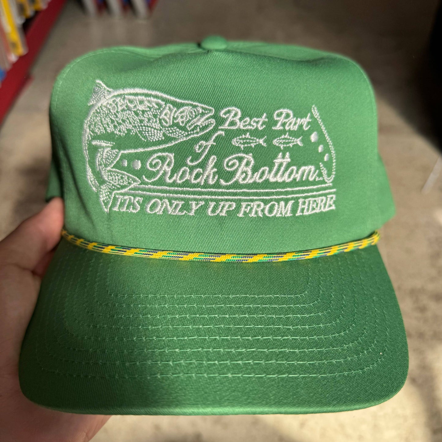 ‘Rock Bottom’ Hat: Green Trucker