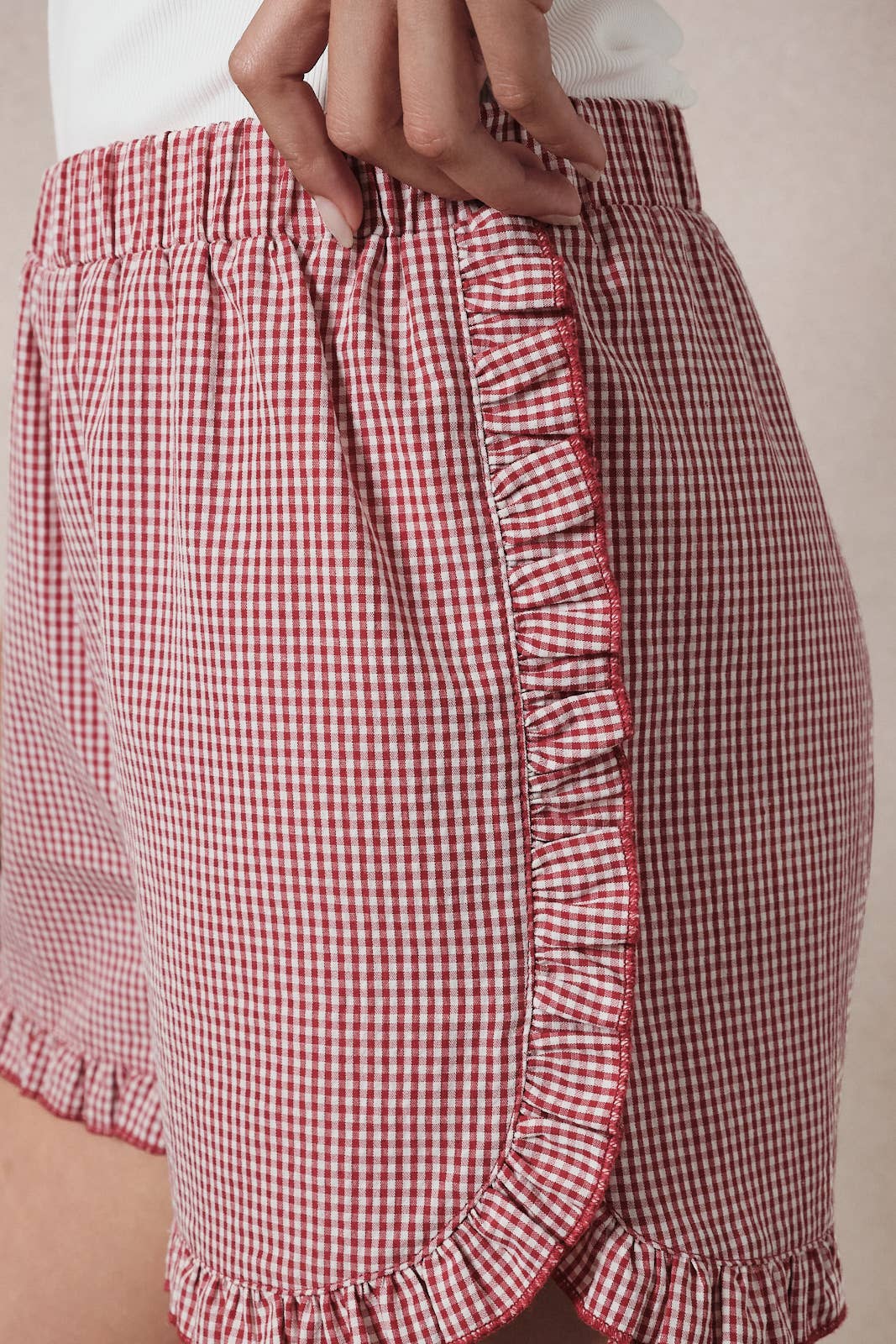 Campbell Ruffle Gingham Dolphin Shorts: Red-White