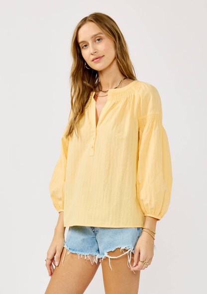 Yellow Jackets 3/4 Sleeve Smocked Henley Blouse: Yellow