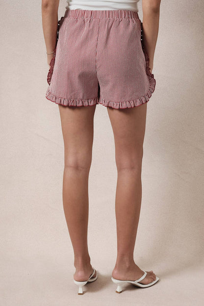 Campbell Ruffle Gingham Dolphin Shorts: Red-White